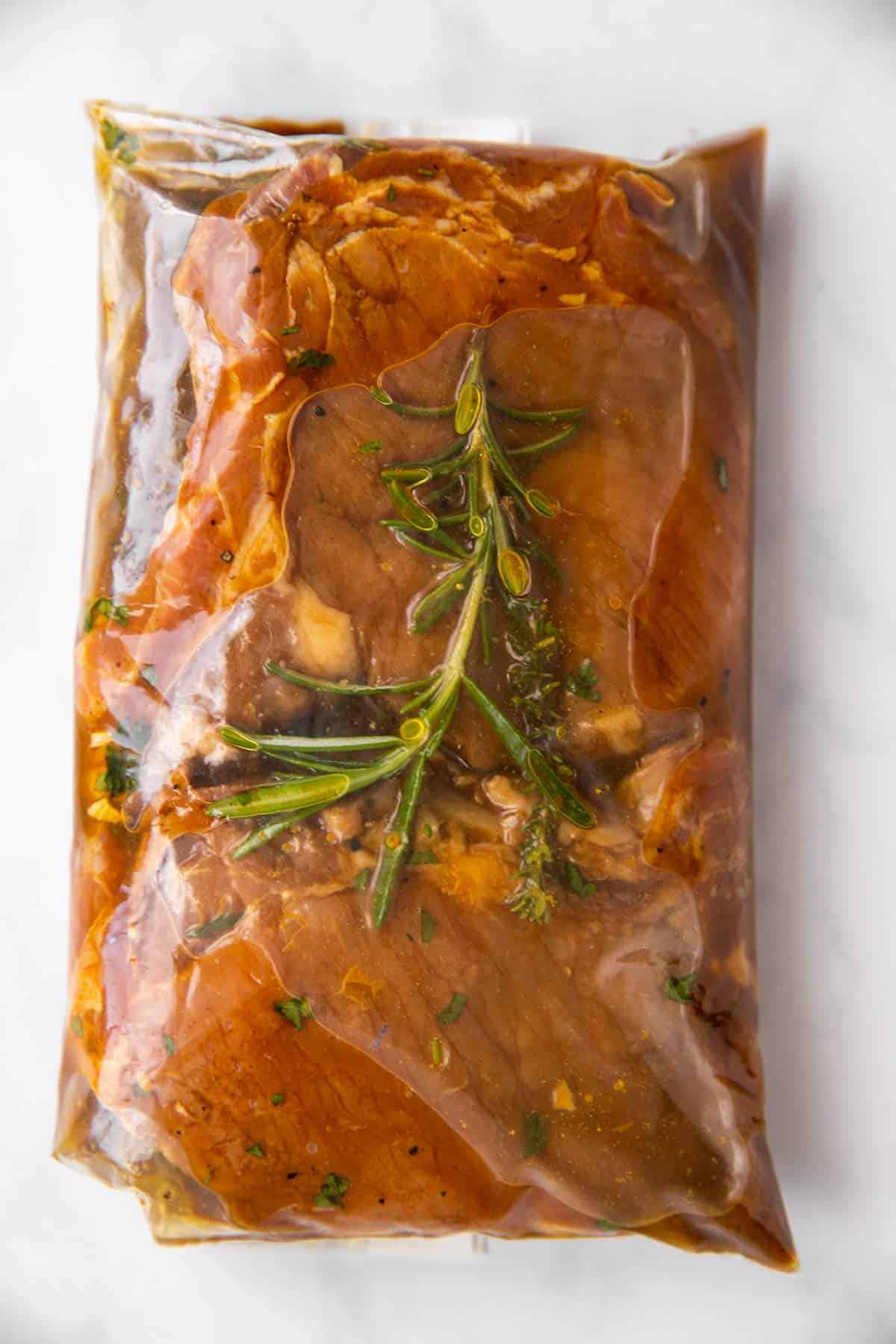ziploc bag with marinated pork chops