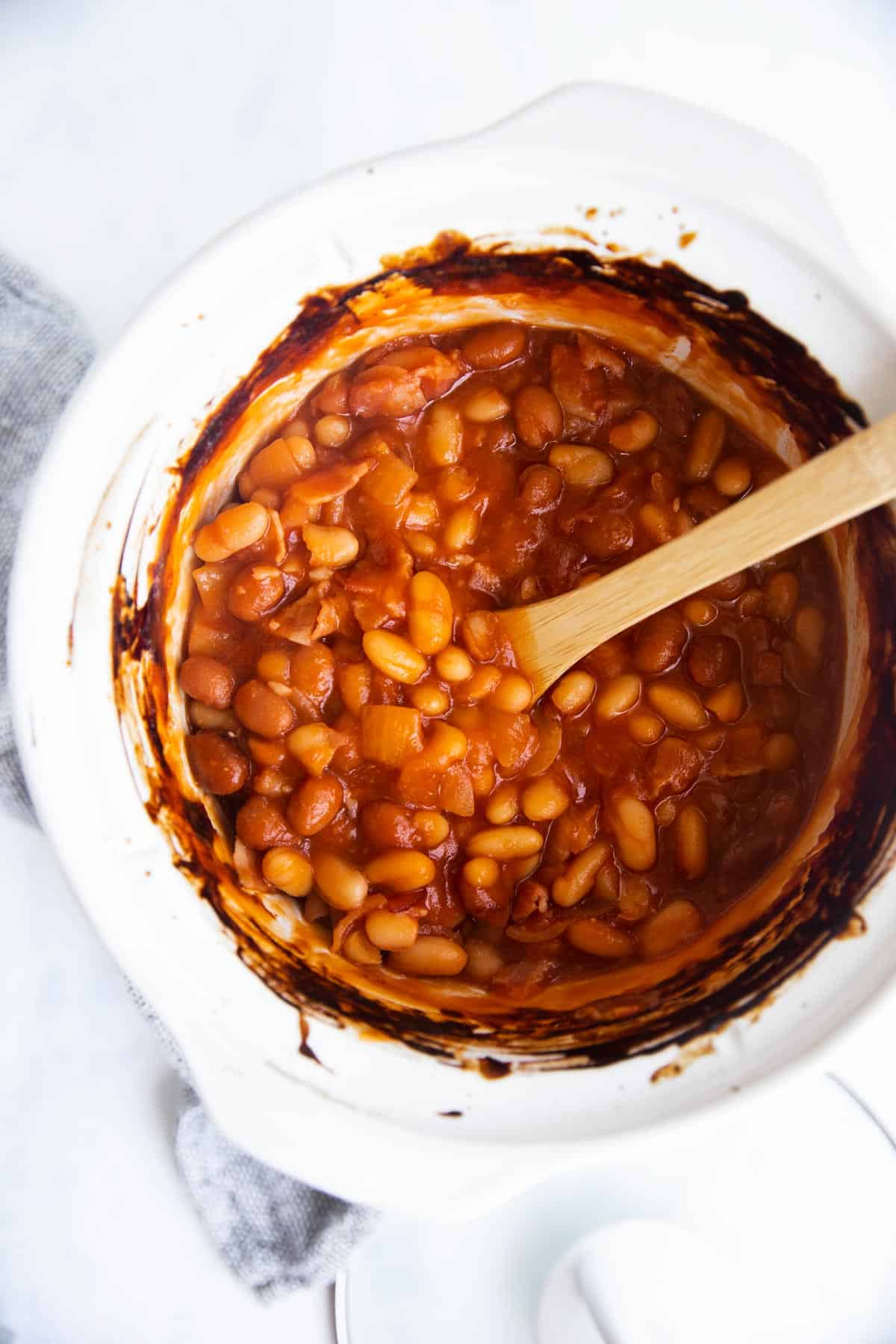 view from top on white crock with baked beans