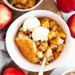 overhead view on three bowls with apple cobbler