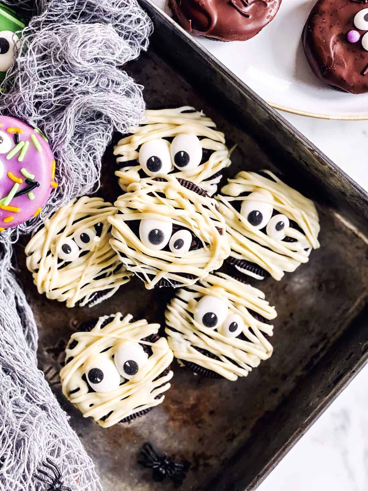 pile of mummy decorated Oreo cookies