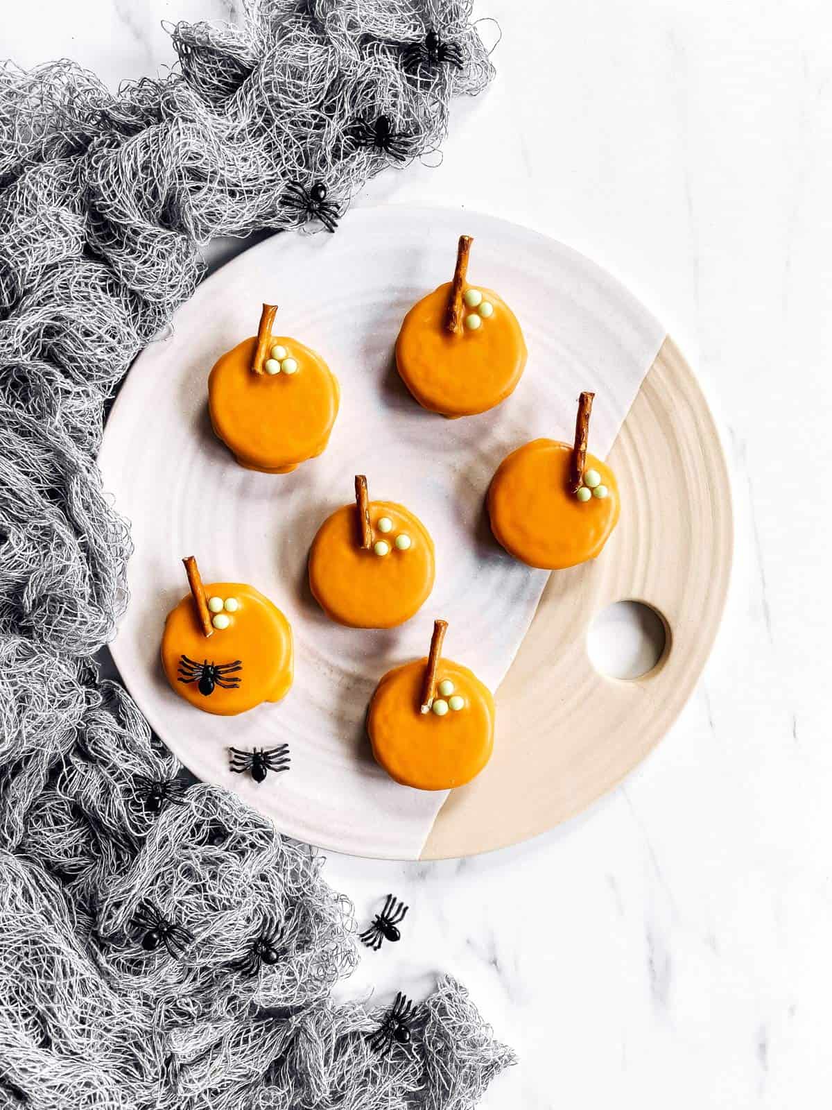 Pumpkin Decorated Oreos for Halloween - Savory Nothings