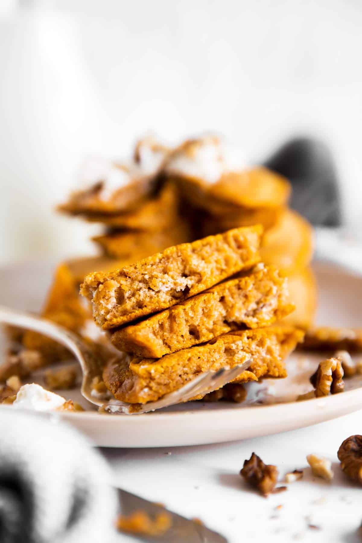 fork with slice of pumpkin pancakes