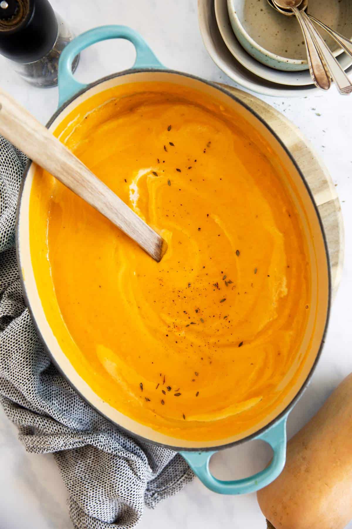 overhead view on pot with butternut squash soup