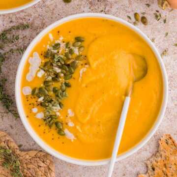 Butternut squash soup in a cozy setting.