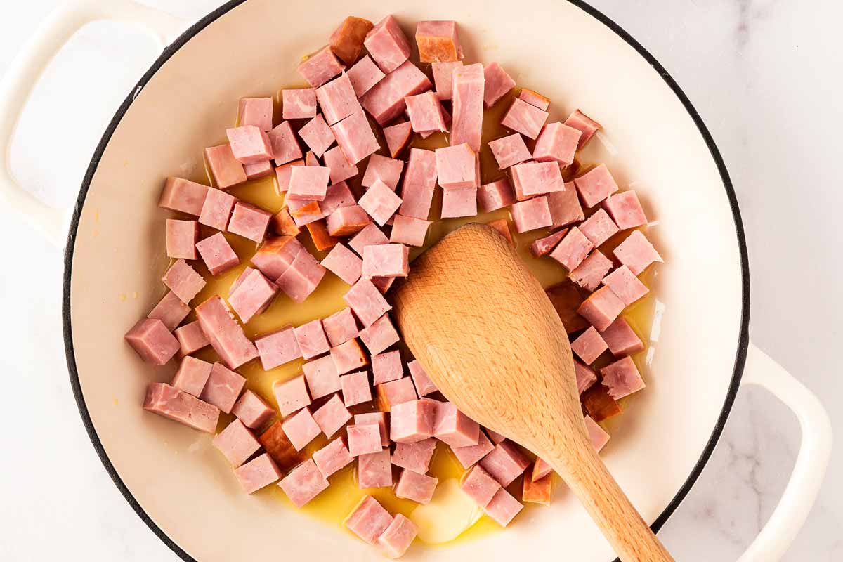 Searing ham cubes.
