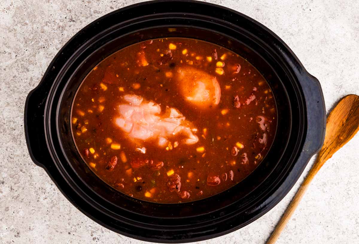 Slow cooker chicken taco soup before cooking.