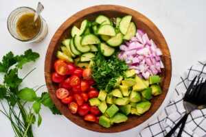 salad before adding dressing in a bowl