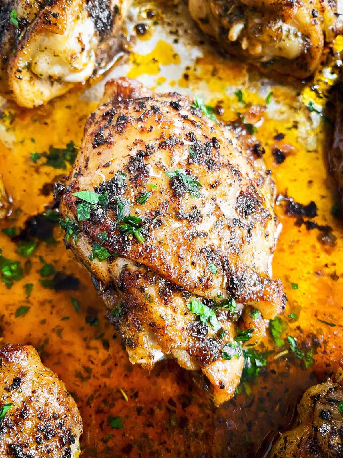 close up photo of baked chicken thigh
