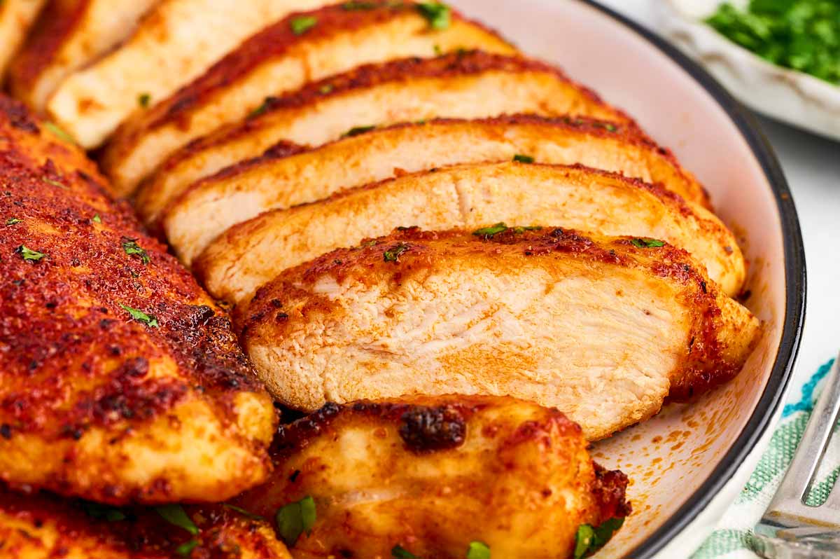 Sliced chicken breast on a plate.