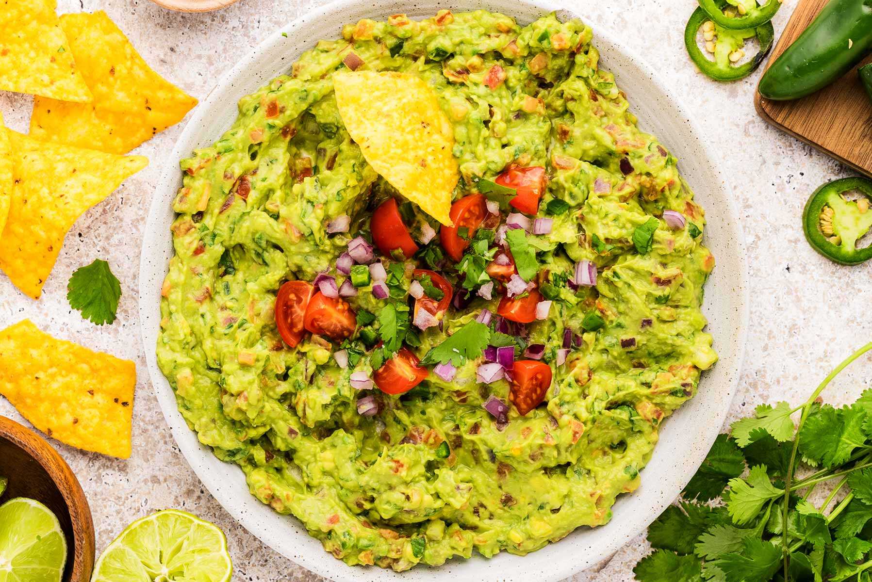 Serving a bowl of guacamole.