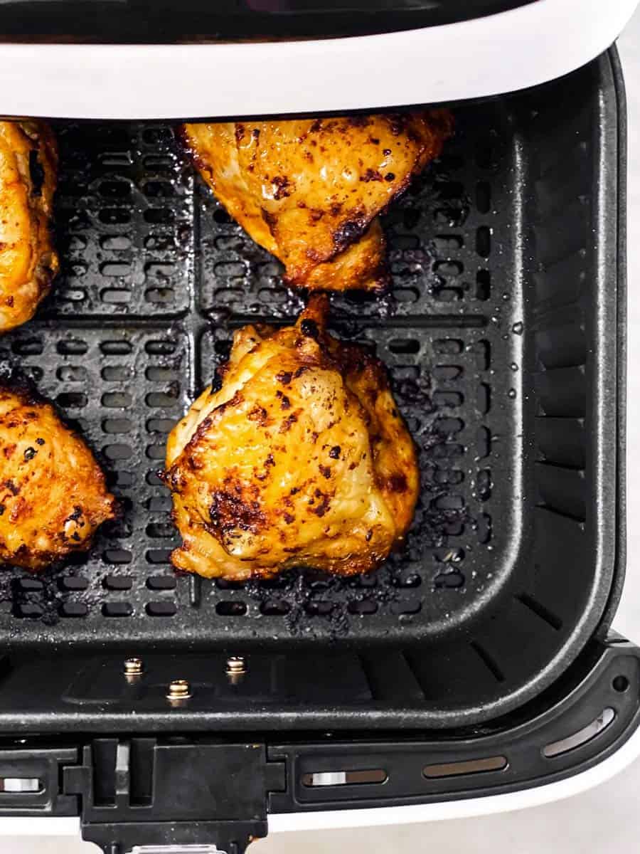 crispy chicken thighs in air fryer basket