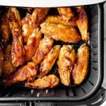 cooked chicken wings in air fryer basket