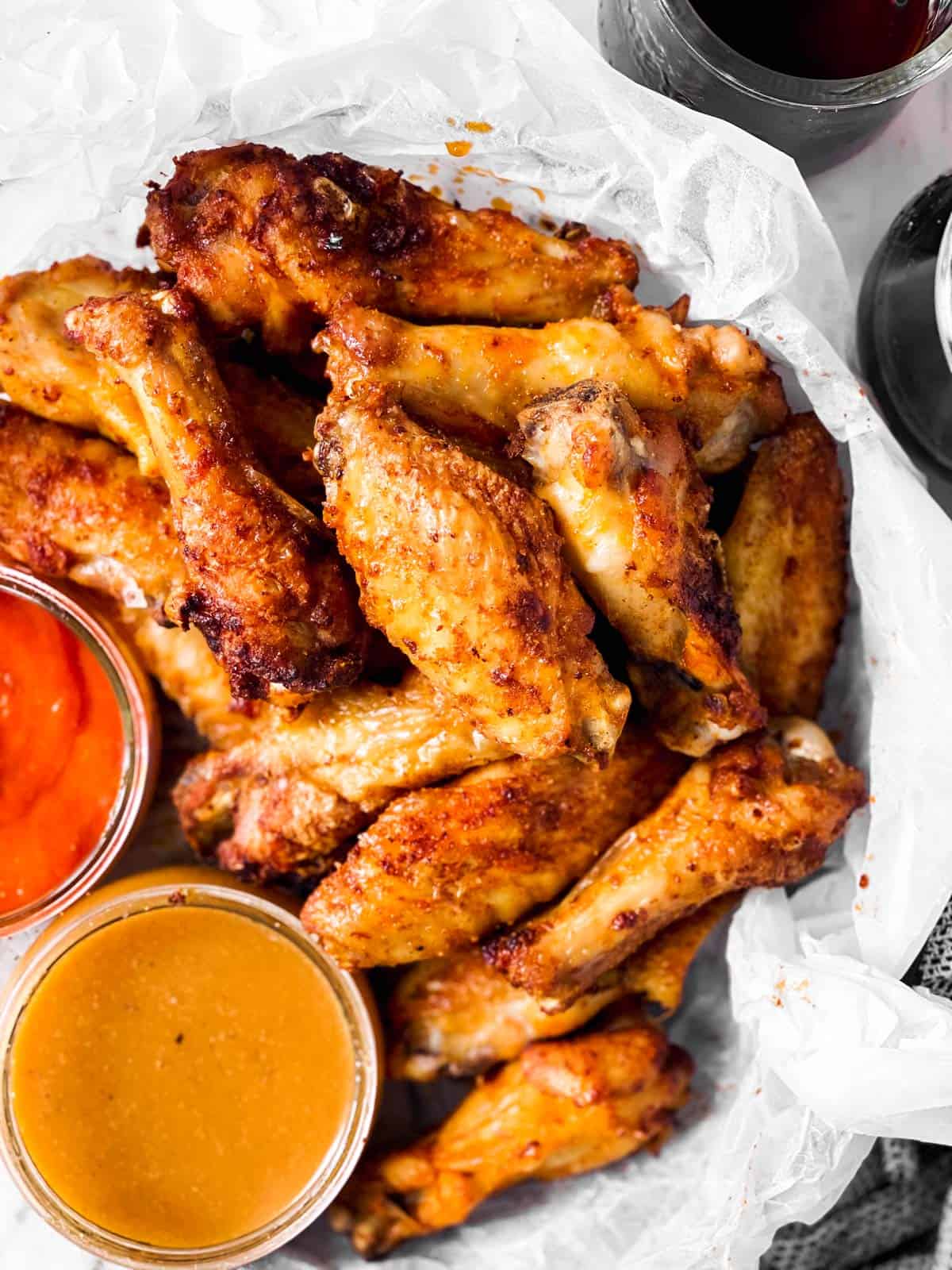 overhead view of bowl with air fryer chicken wings