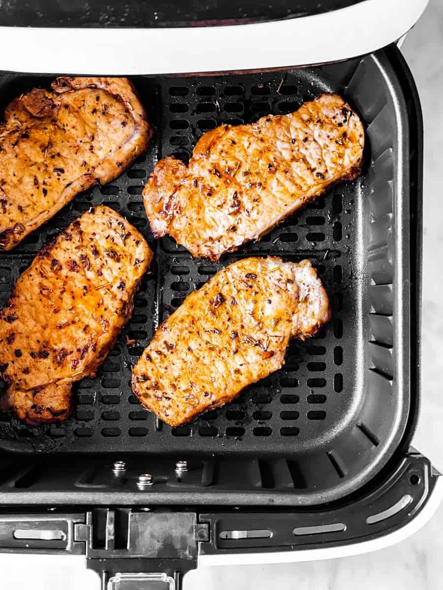 cooked pork chops in air fryer basket