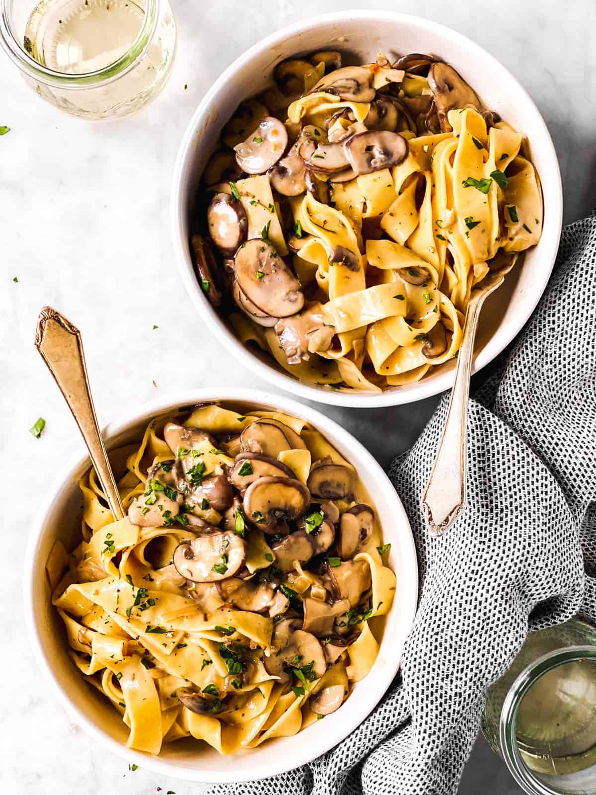 overhead view of two bowls with mushroom stroganoff