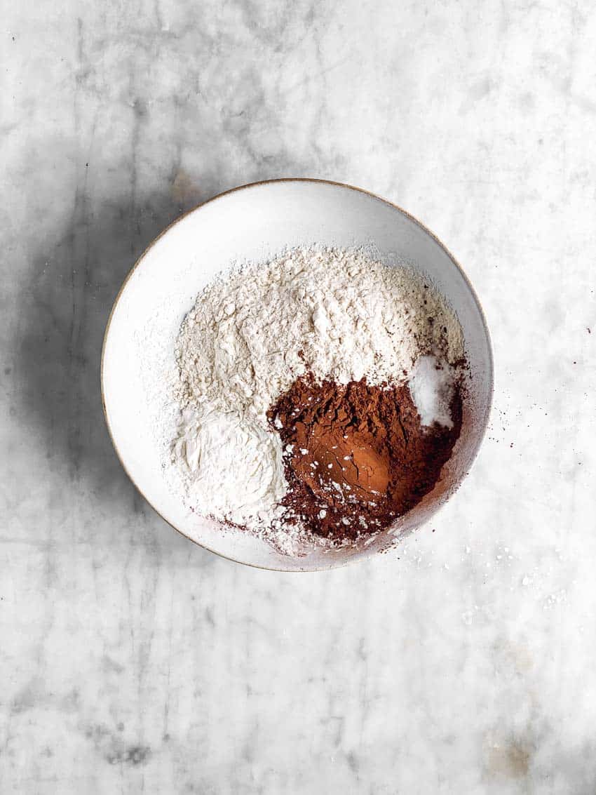 white bowl with dry ingredients for red velvet cupcakes