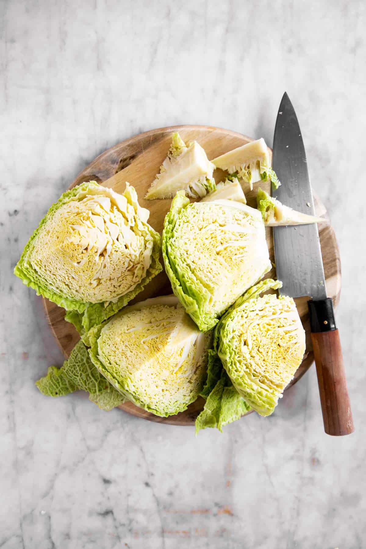 cabbage cut into quarters and stem removed