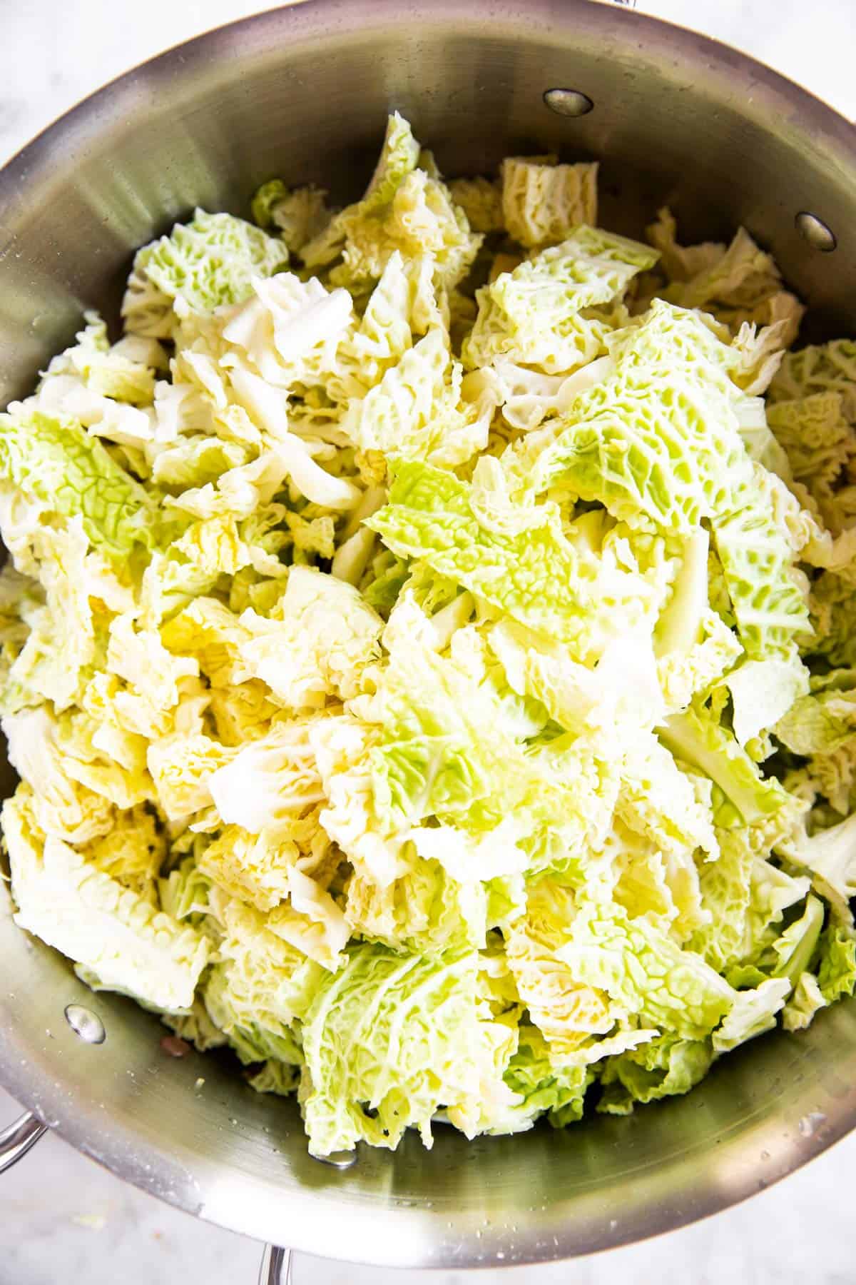 diced cabbage in skillet