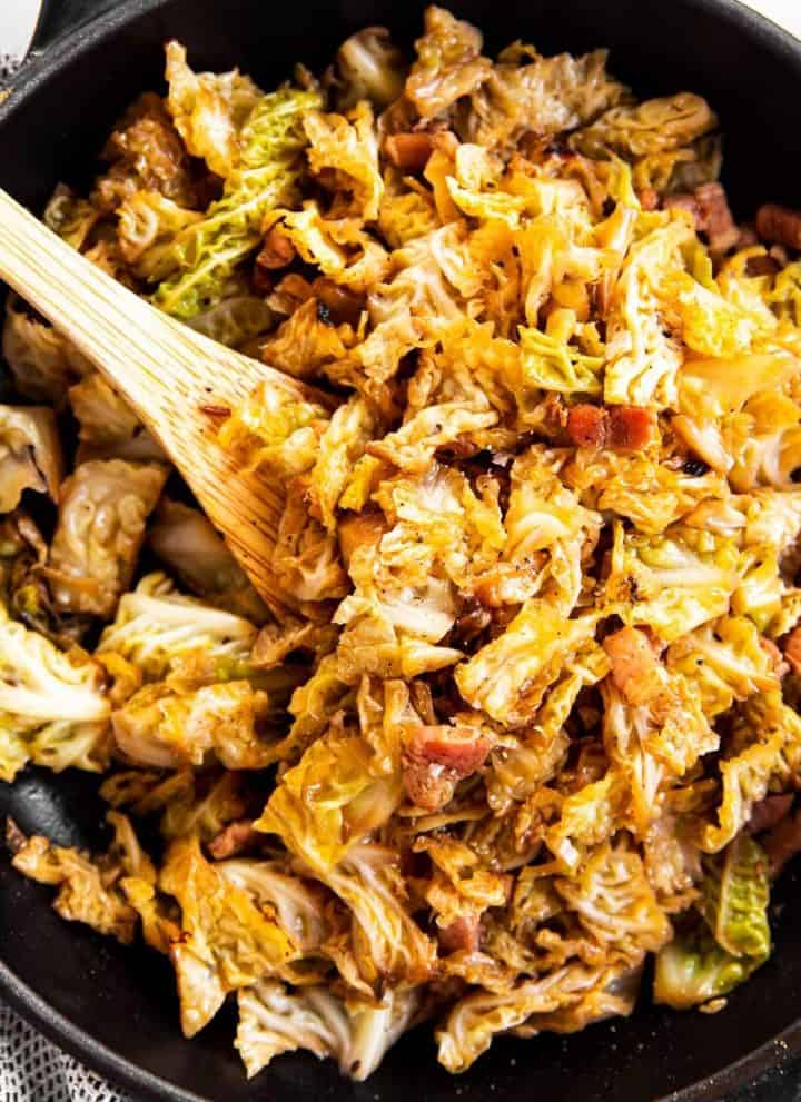 bacon braised cabbage in black cast iron skillet