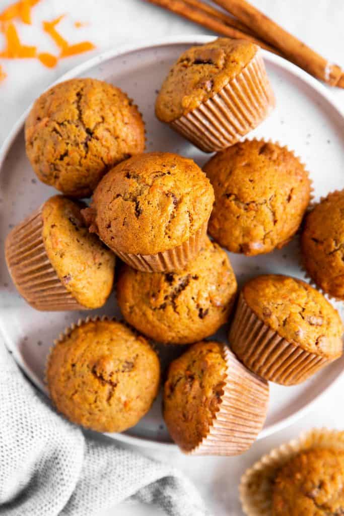 several carrot muffins on white plate