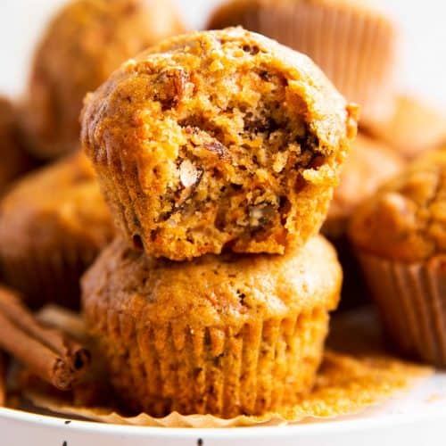 stack of carrot muffins on white plate