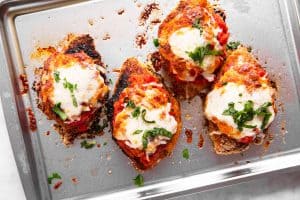 baked chicken parmesan on sheet pan