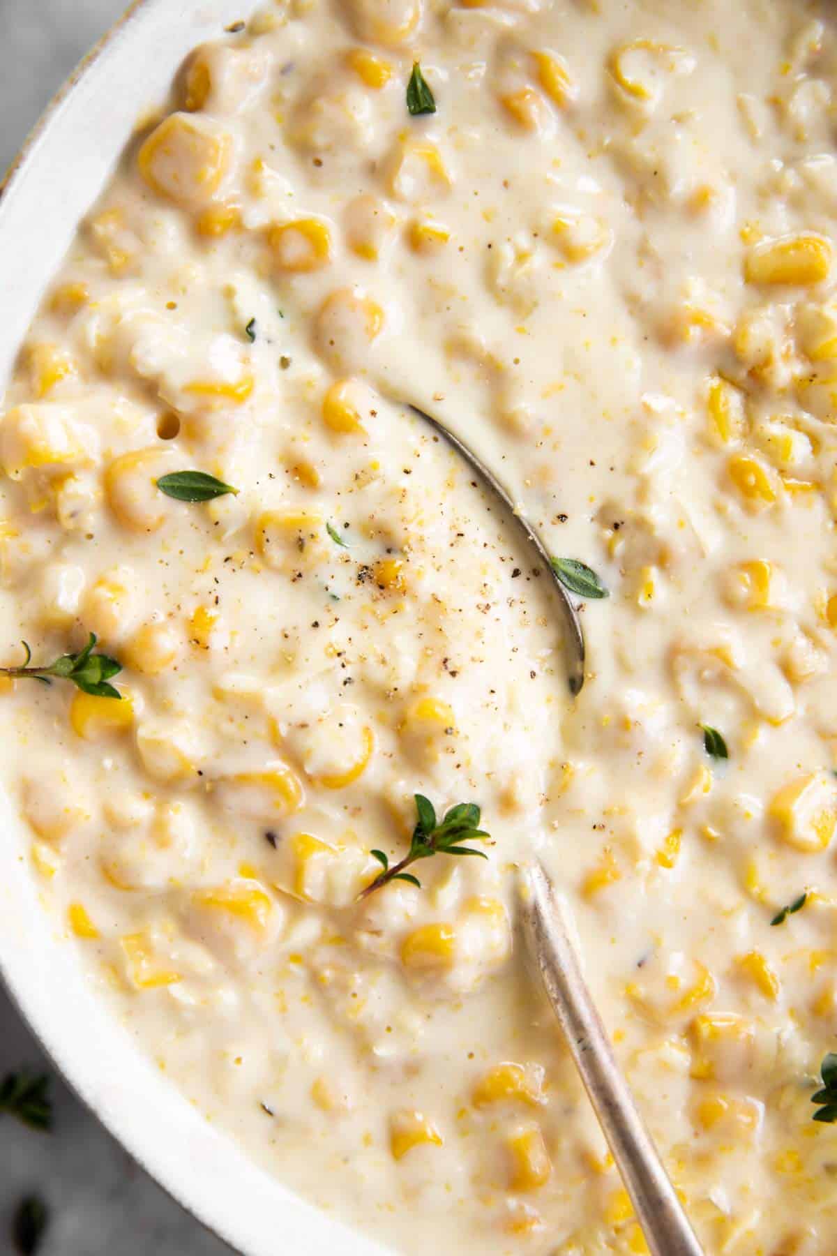 spoon in bowl of creamed corn