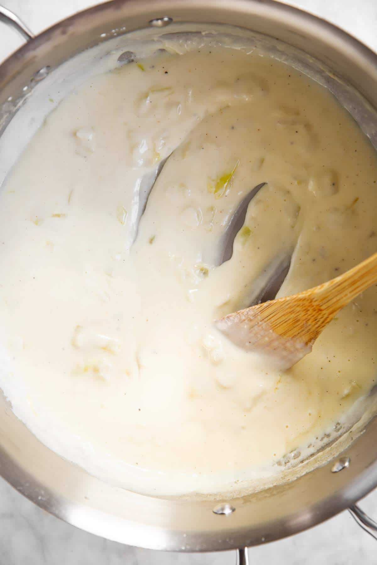 skillet with béchamel sauce