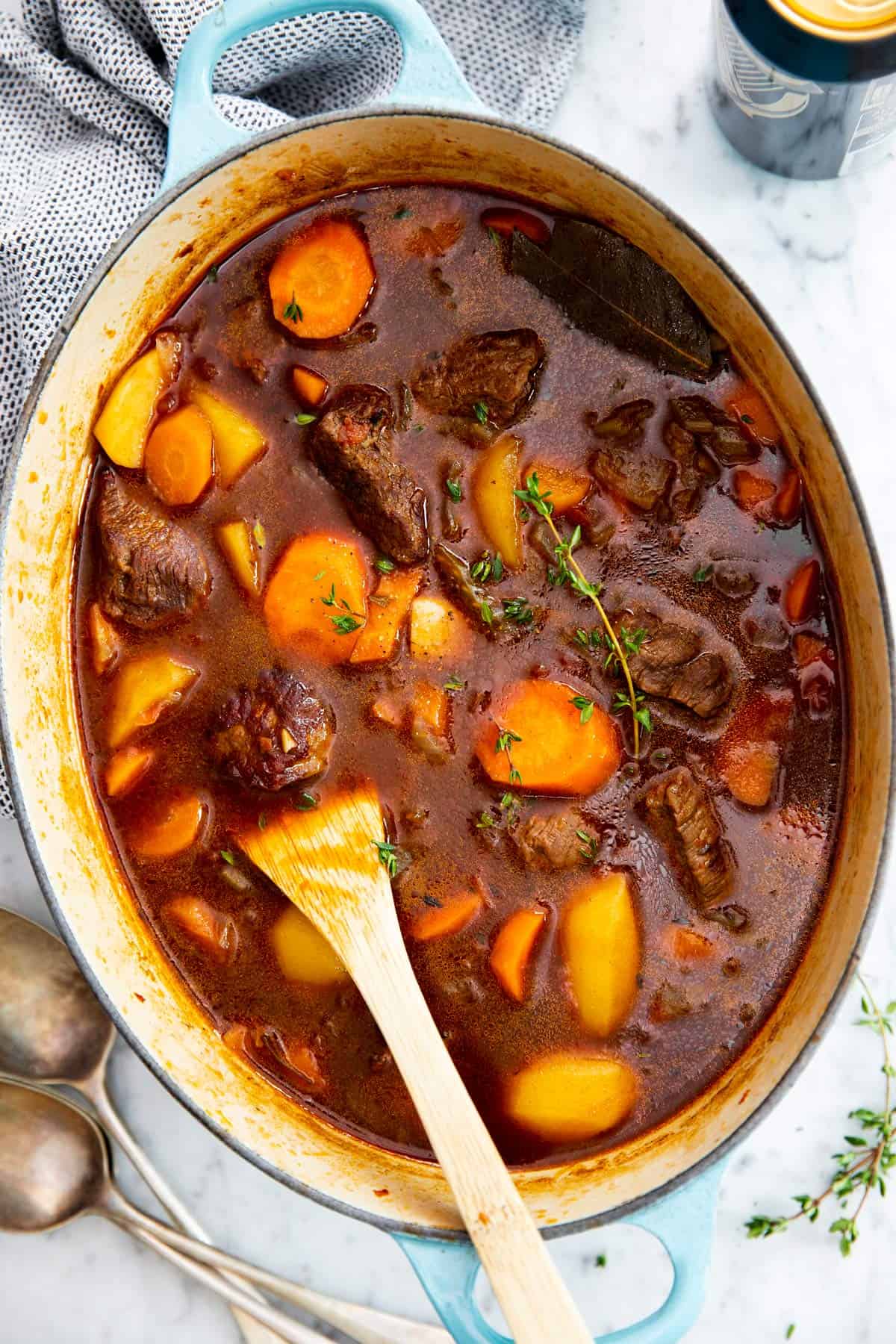 overhead view of cast iron pot with Guinness beef stew