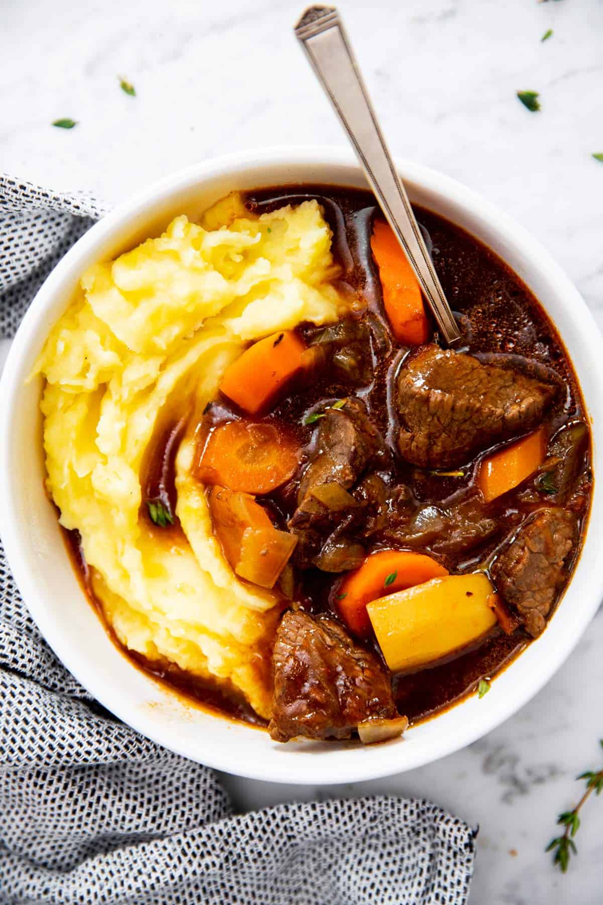 white bowl filled with Guinness beef stew