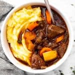 white bowl filled with Guinness beef stew