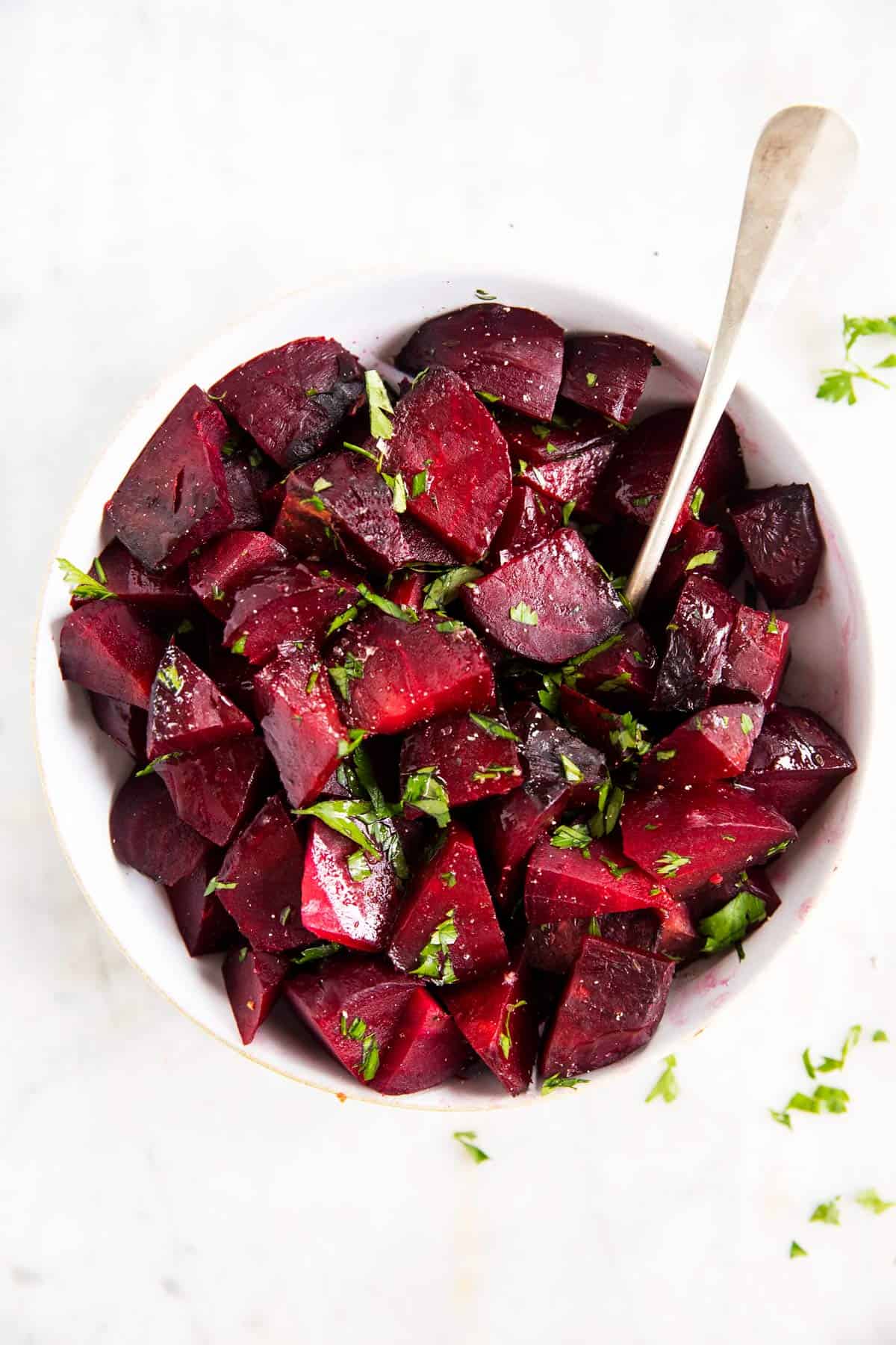 white bowl filled with roasted beets