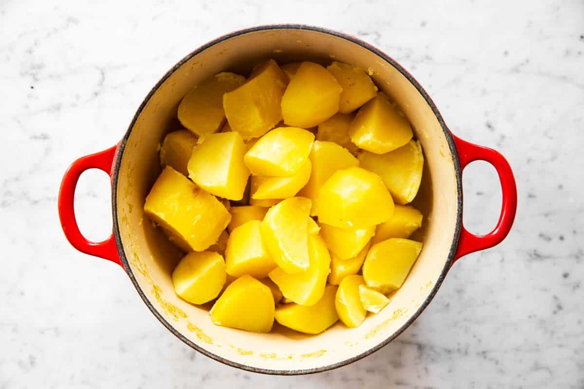 overhead view of cooked potatoes in pot