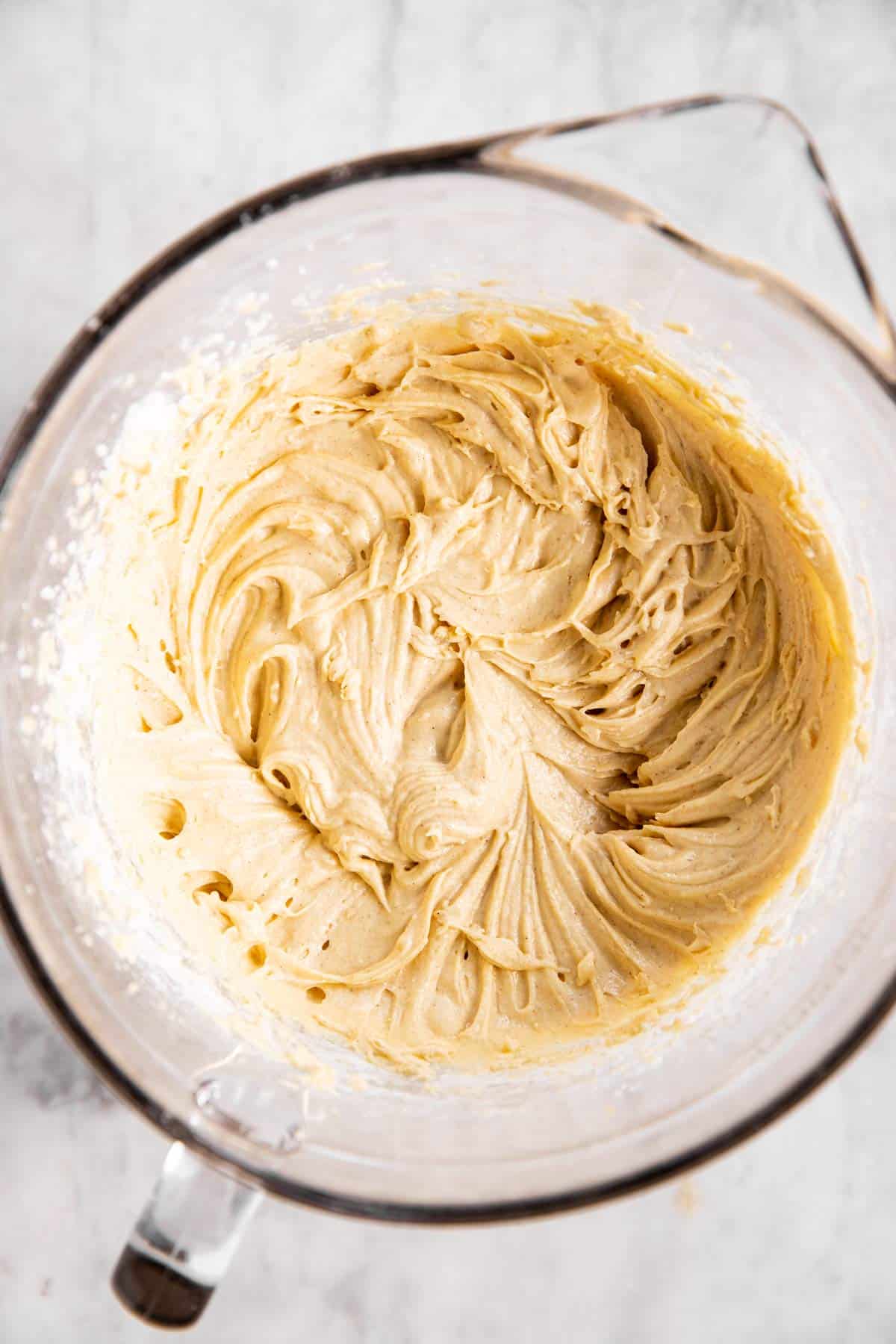 cake batter for pineapple upside down cake in glass bowl