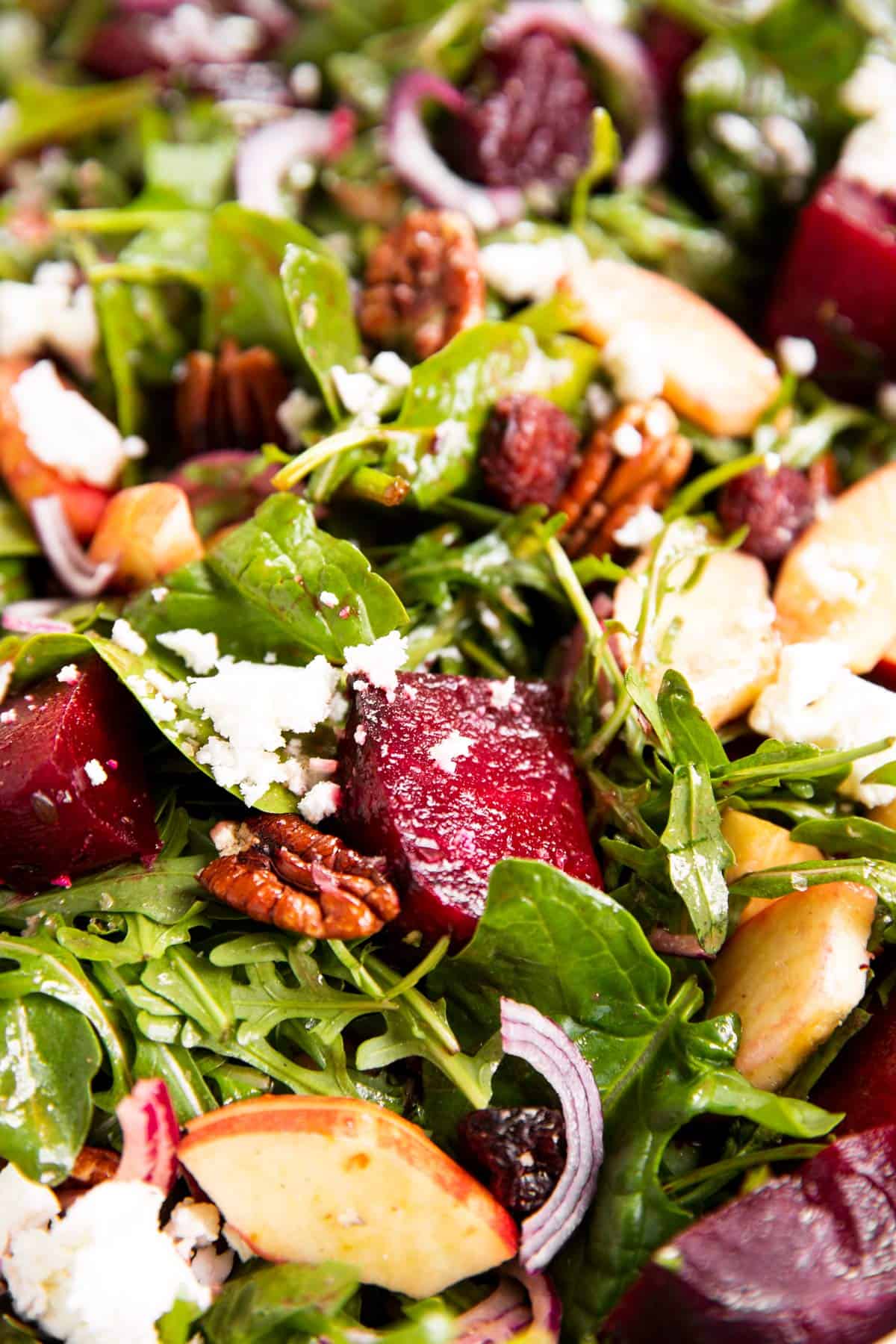 close up photo of roasted beet salad with goat's cheese