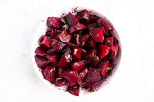 bowl with roasted beets in marinade