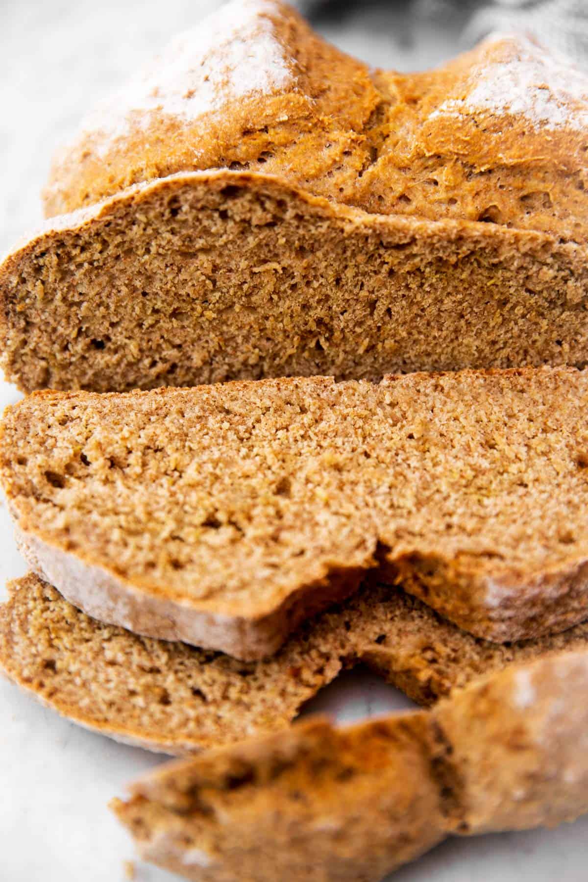 Irish soda bread with a few slices sliced off