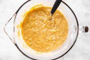 banana bread batter in glass bowl