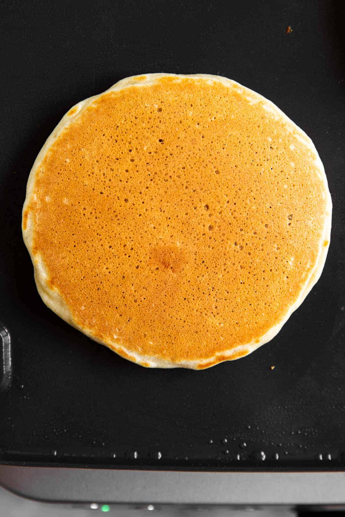 flipped pancake on griddle