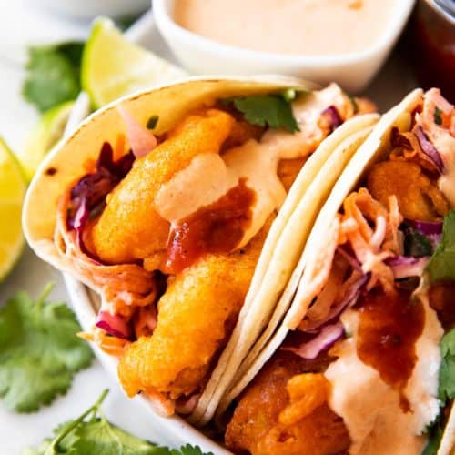 https://www.savorynothings.com/wp-content/uploads/2021/04/fish-tacos-image-sq-500x500.jpg