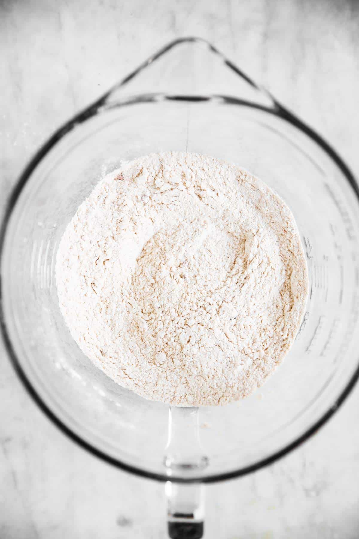 dry ingredients for beer batter in glass bowl