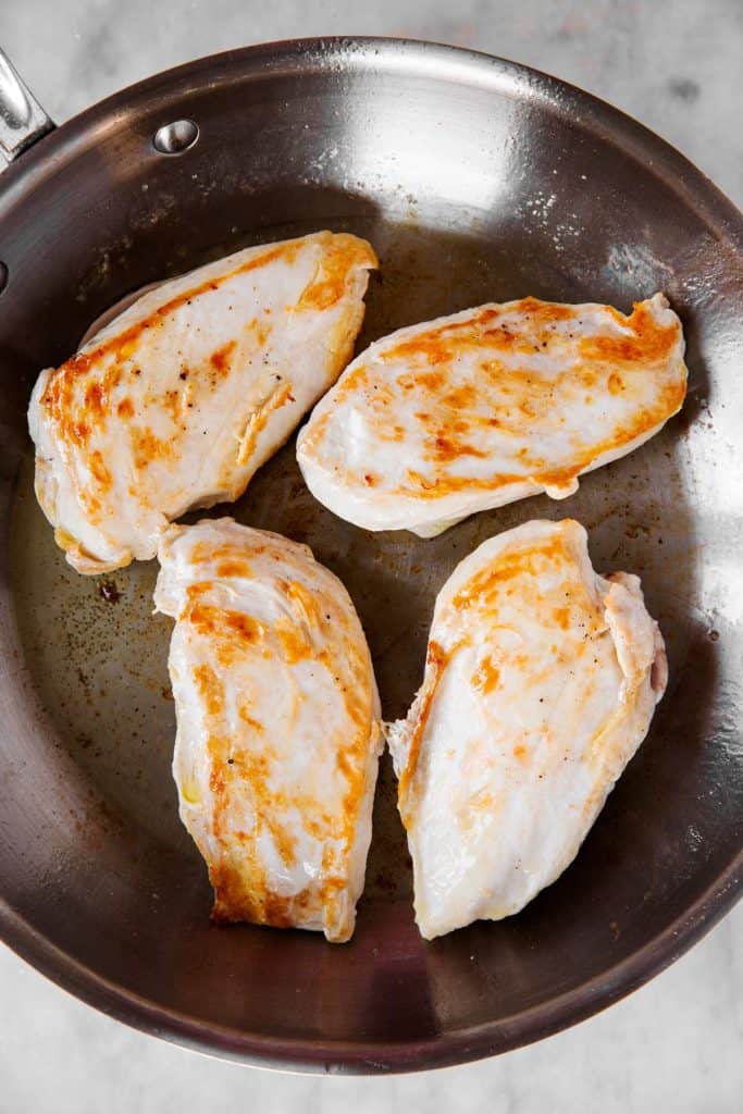 seared chicken breast in skillet