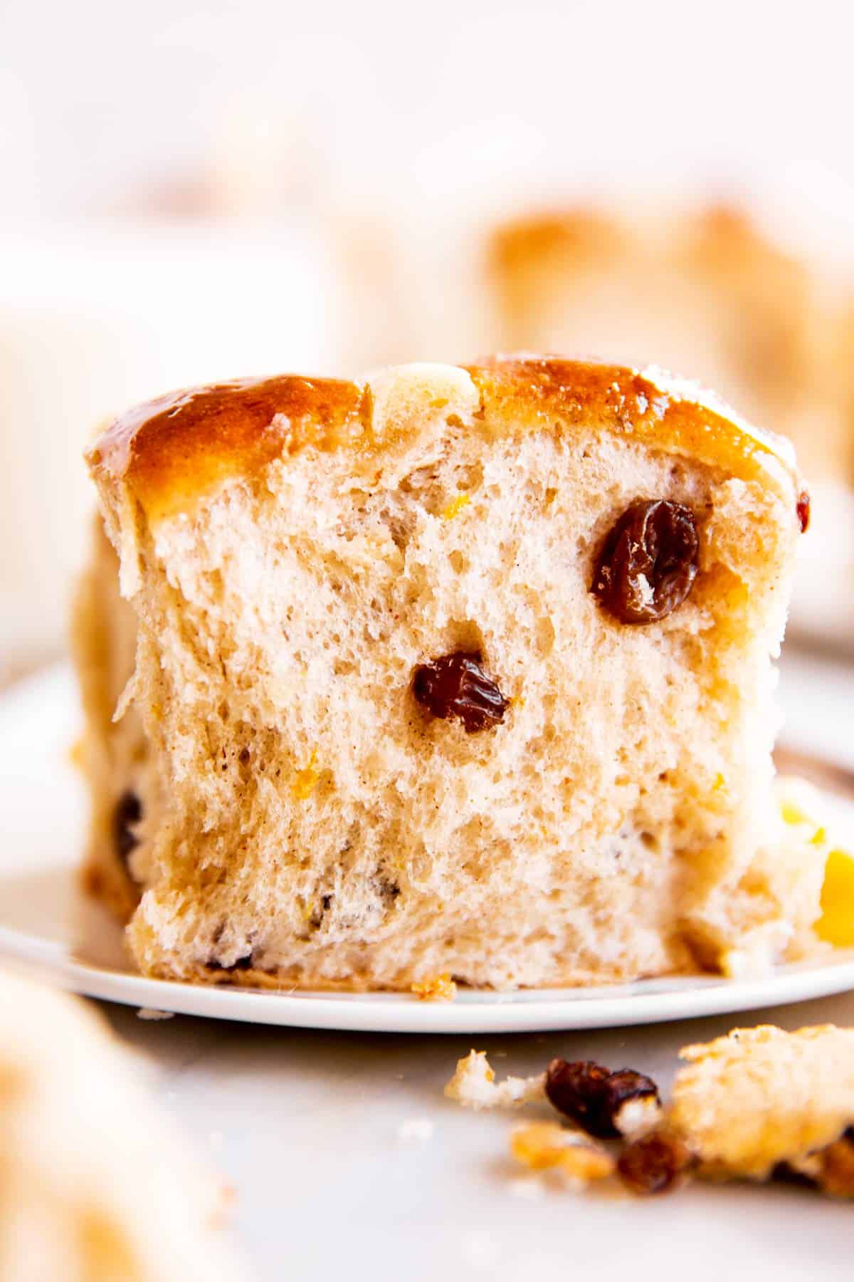 hot cross bun on small white plate