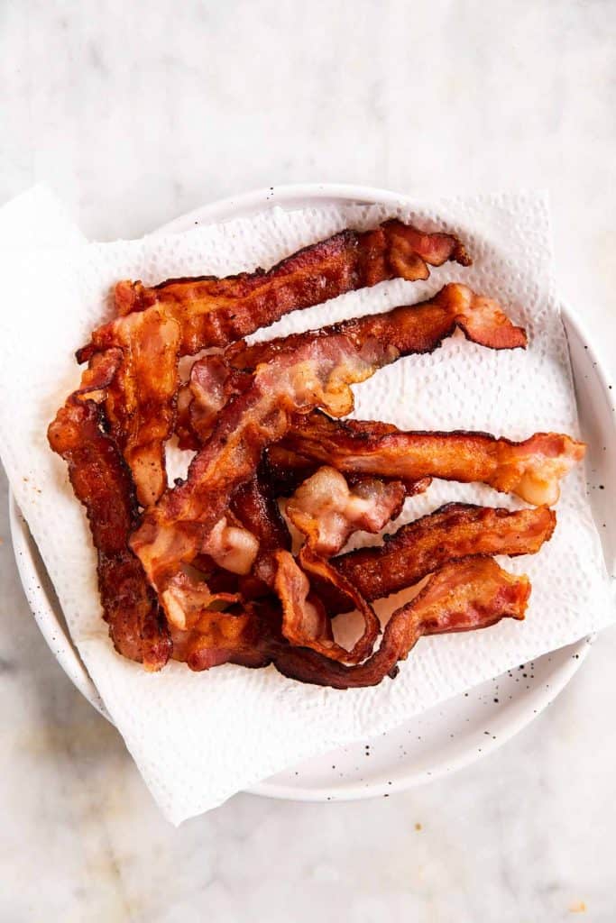 crispy cooked bacon on paper towels