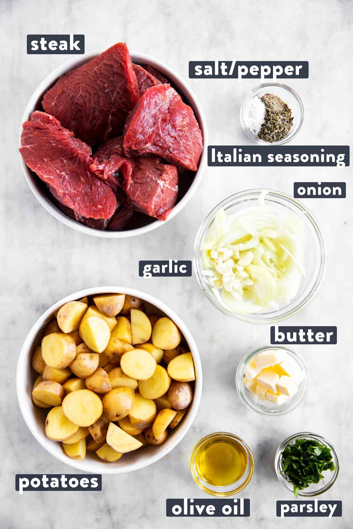 ingredients for steak and potato foil packets with text labels