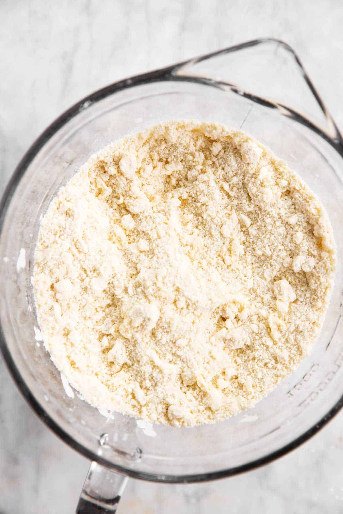 butter and flour mixture for shortcake biscuits in glass bowl