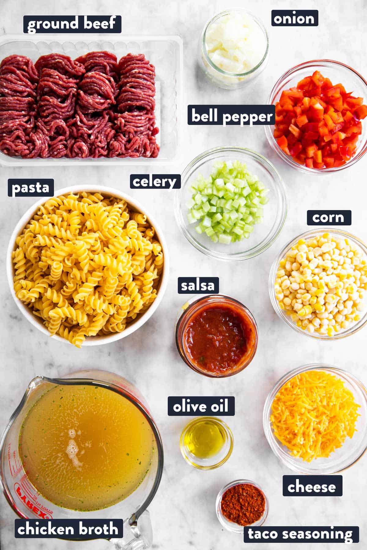 ingredients for one pot taco pasta with text labels