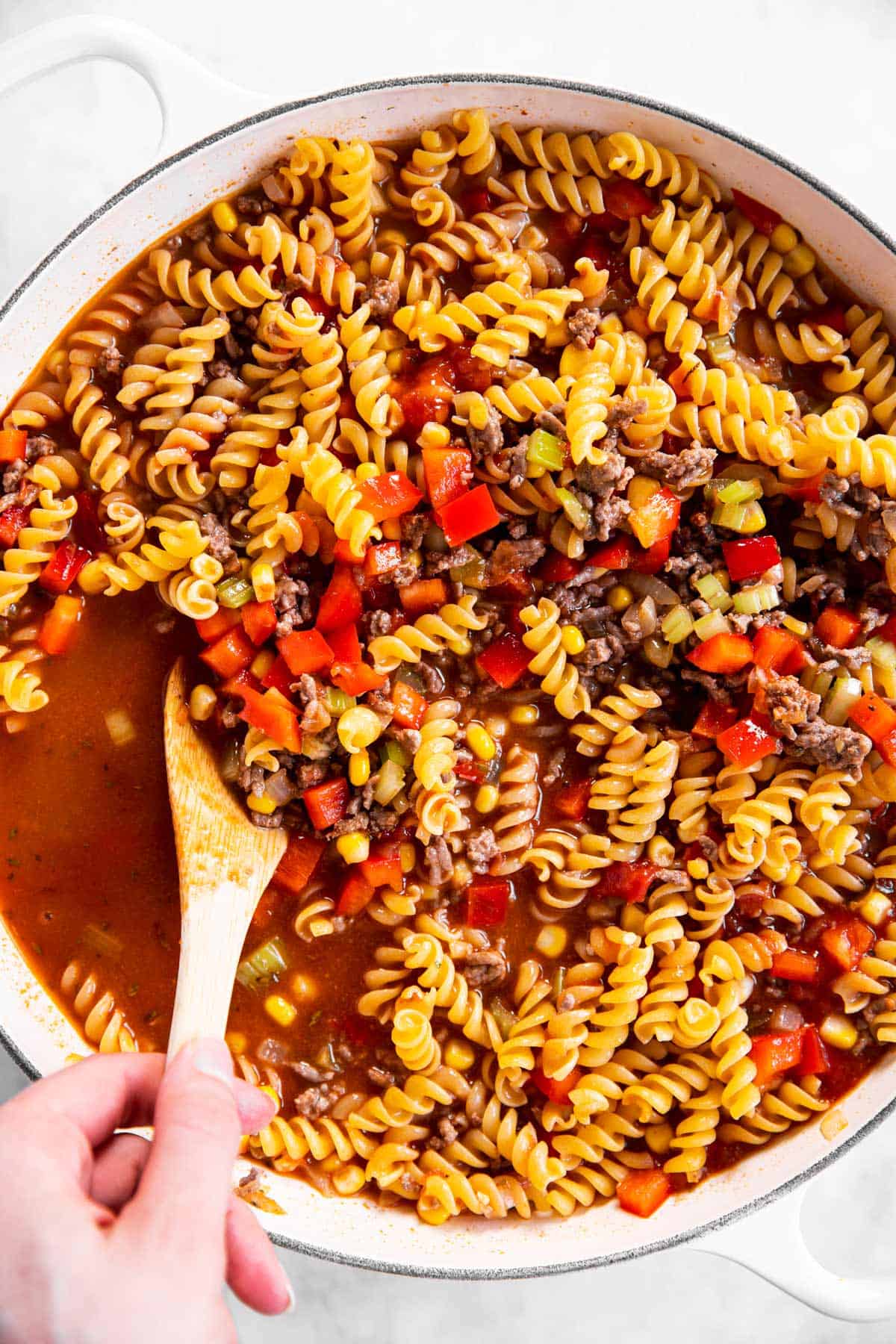 uncooked taco pasta in white skillet