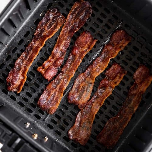 cooked bacon in air fryer basket