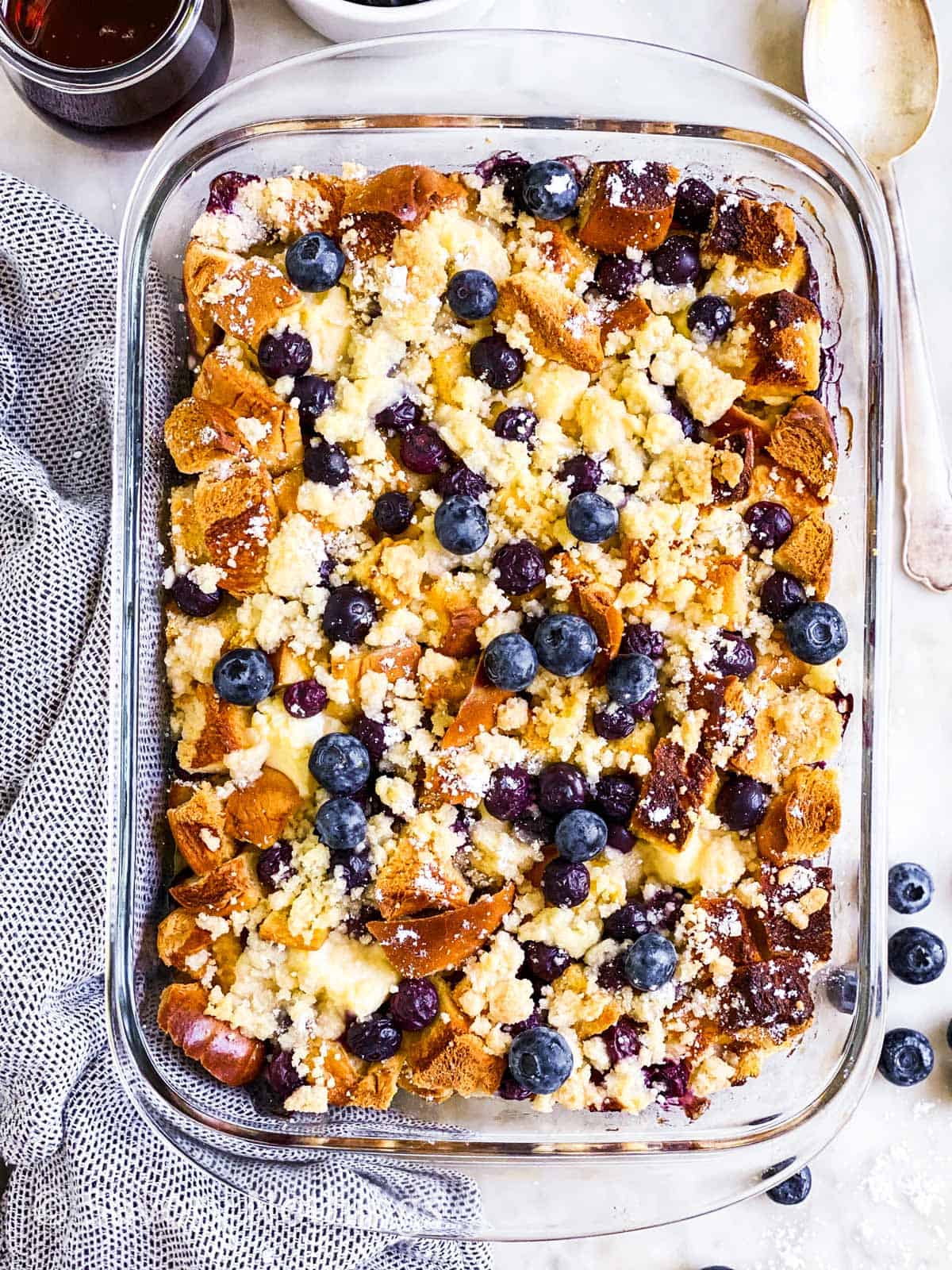 overhead view of blueberry French toast casserole in glass dish